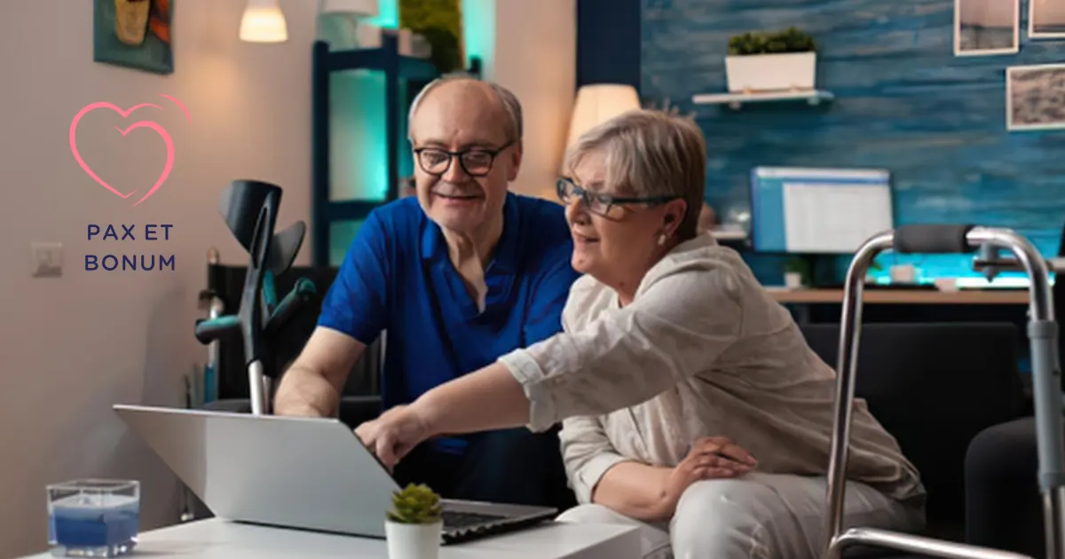 Starsze małżeństwo przy laptopie w domu, logowanie do serwisu urzędowego